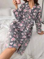 Back view of a calf-length women's robe designed for cozy lounging