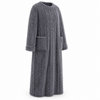 Woman wearing a cozy fleece blanket dress with front pockets