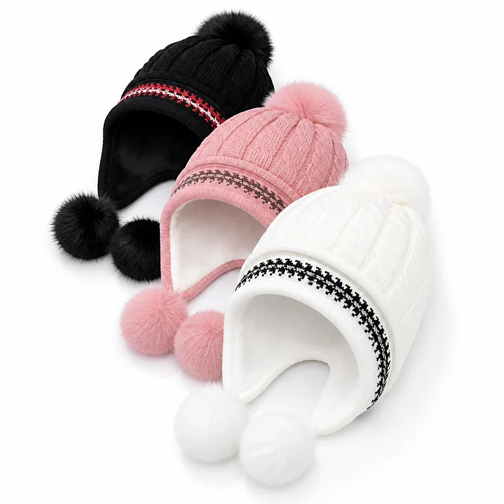 Cable-knit pattern visible across the women's winter hat