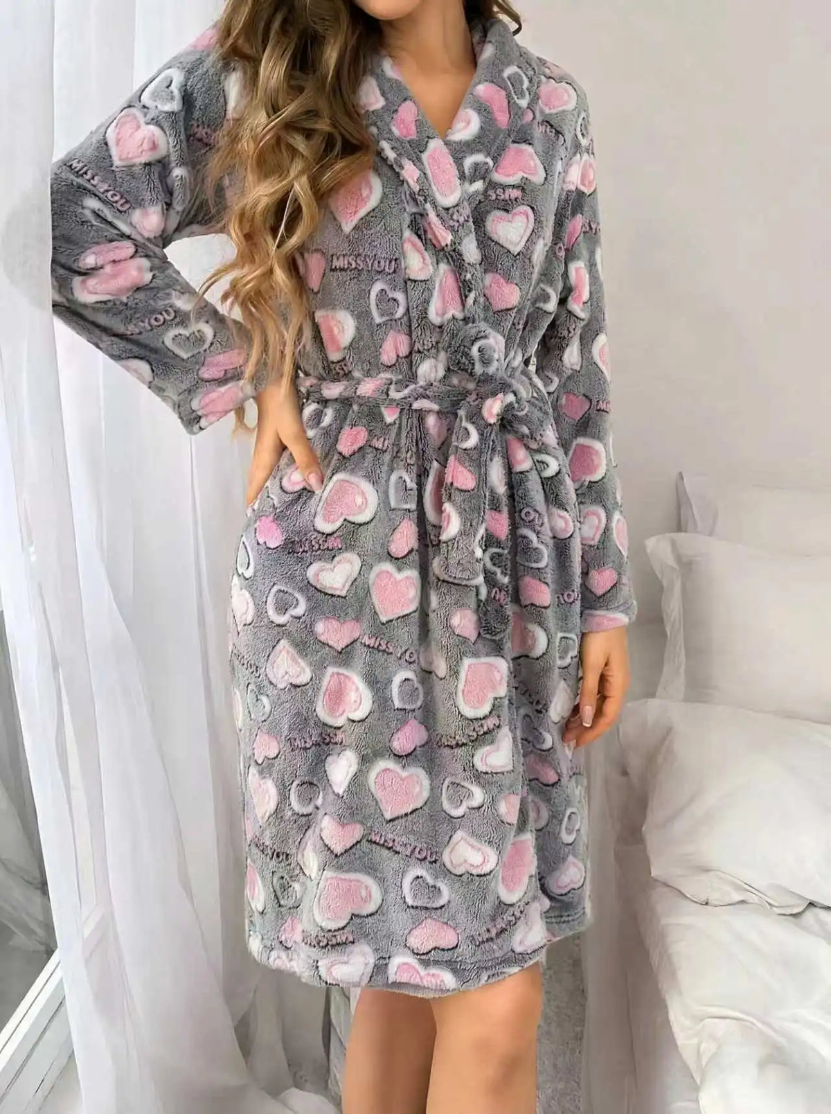 Women's bathrobe with long sleeves and a secure adjustable belt