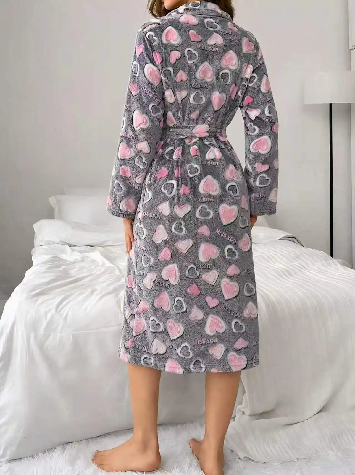 Close view of the flannel texture on a women's calf-length robe