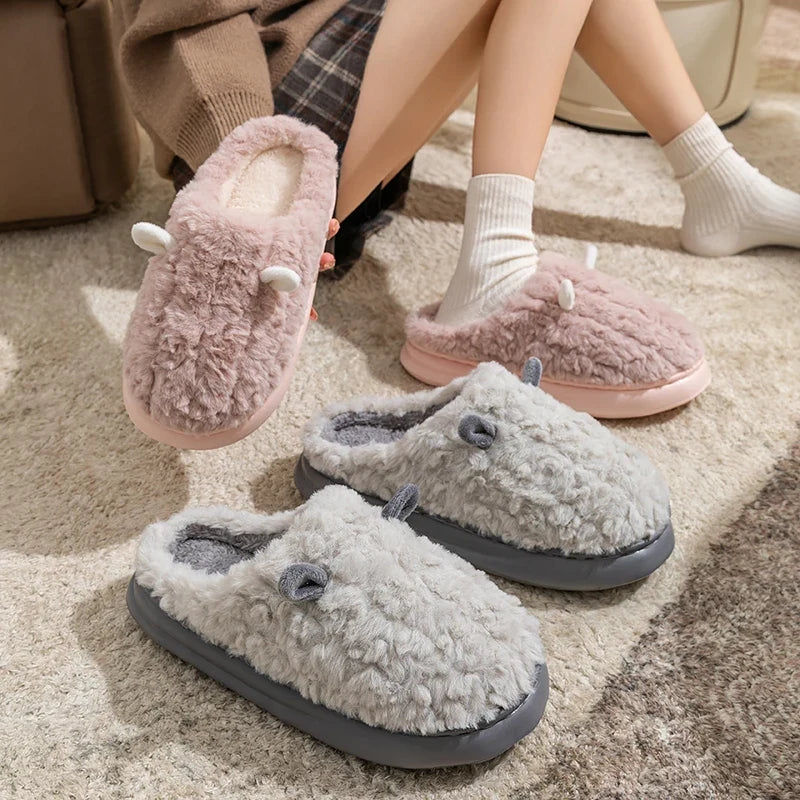 Pair of cozy slippers displayed from the side