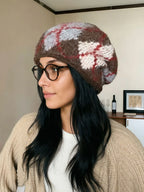 Back view of the knit earflap beanie showing its warm design