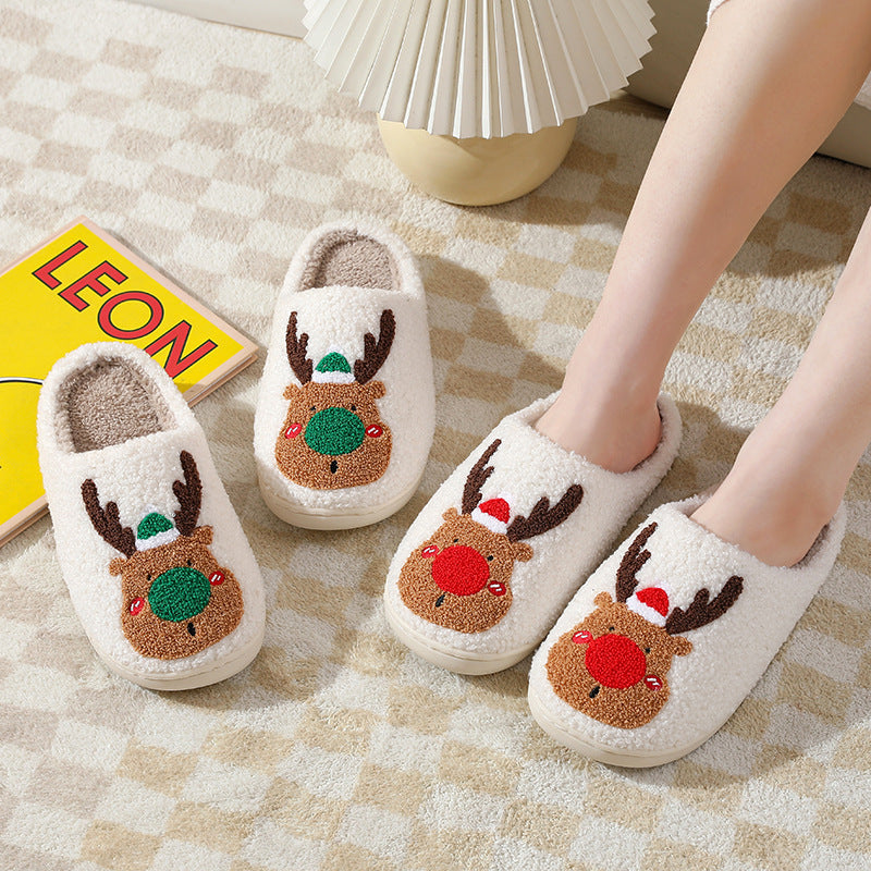 Soft plush elk slippers resting on a bedroom floor