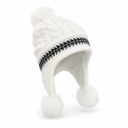 Front view of a women's knit beanie with protective earflaps