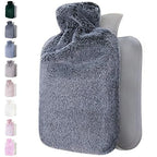 Hot water bottle resting inside its plush cover