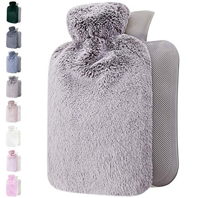 Hot water bottle with a soft sleeve for cozy bedtime warmth