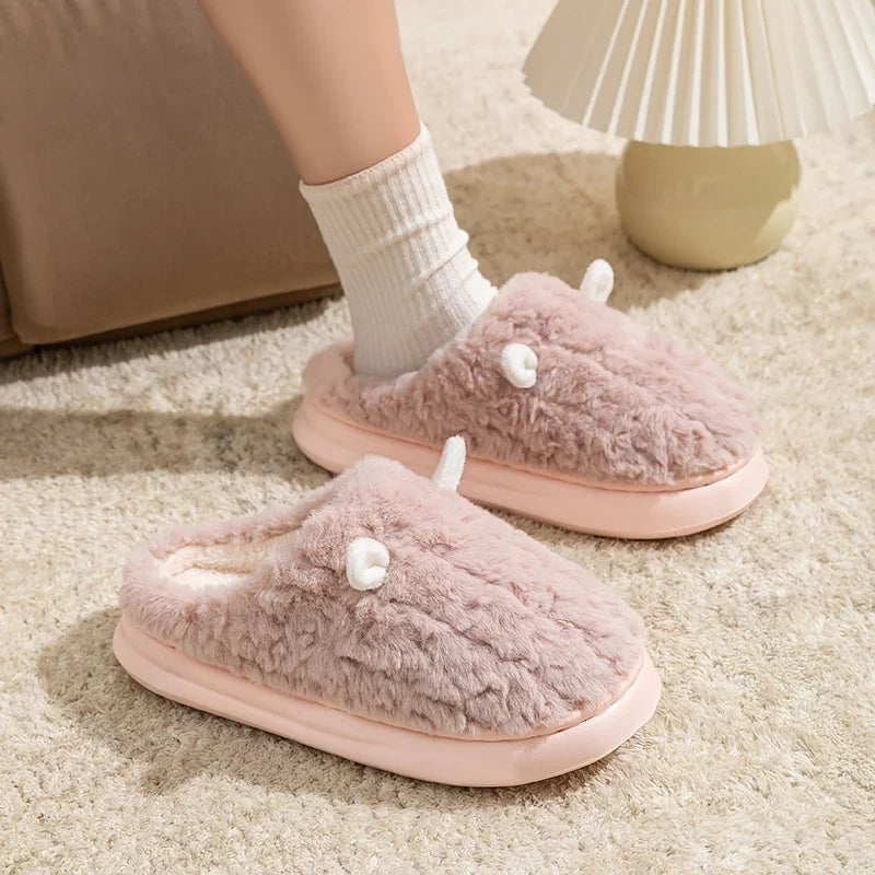 Unisex slippers with textured rubber soles for indoor traction