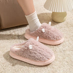 Unisex slippers with textured rubber soles for indoor traction