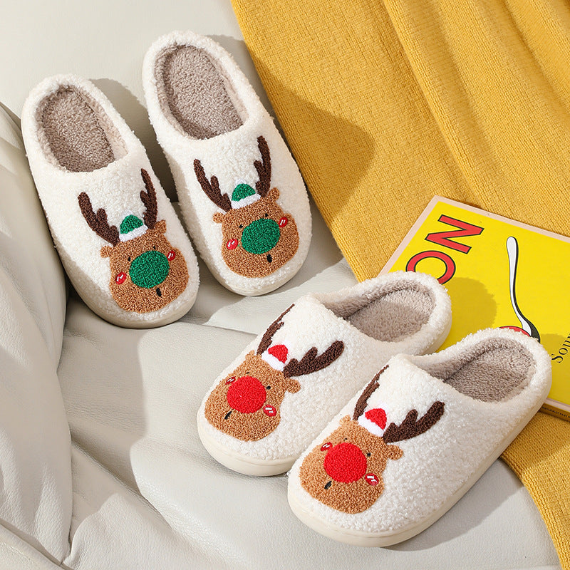 Plush Christmas elk slippers displayed as cozy winter house shoes