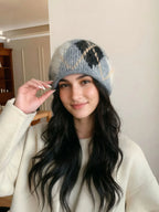 Detailed view of the soft knit texture and diamond pattern